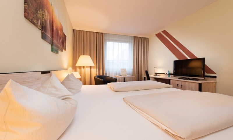 Novina hotel suedwestpark nuernberg bett